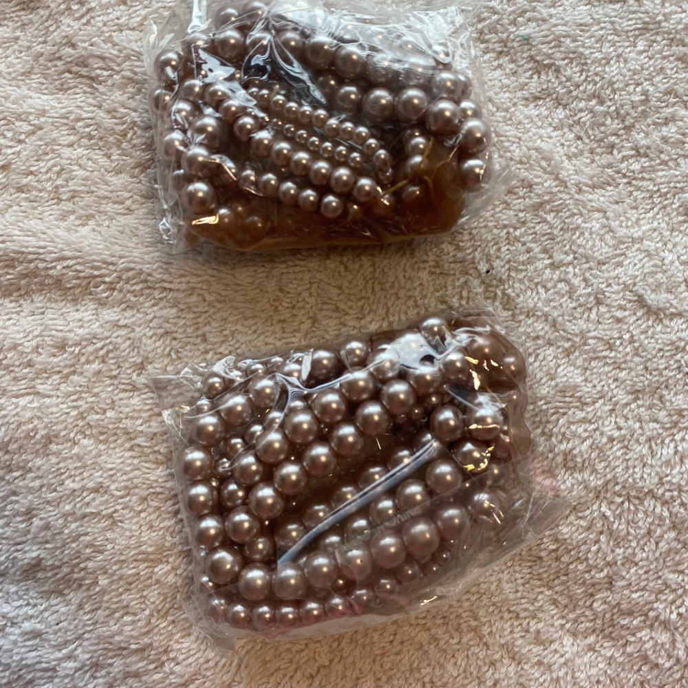 2 pkts of pinkish pearls
